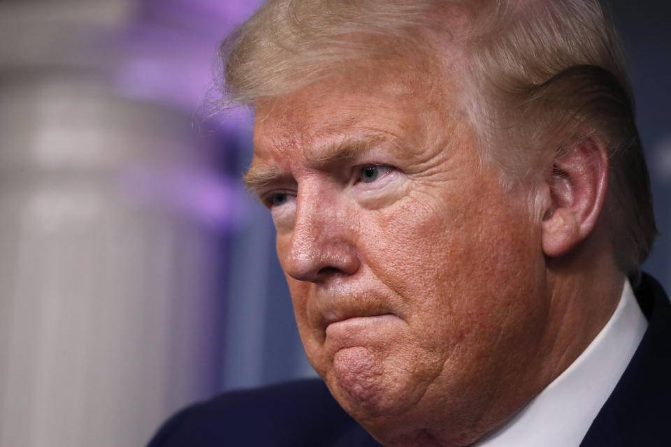 President Donald Trump listens during a briefing about the coronavirus in the James Brady Press Briefing Room of the White House, Wednesday, April 1, 2020, in Washington. (AP Photo/Alex Brandon)