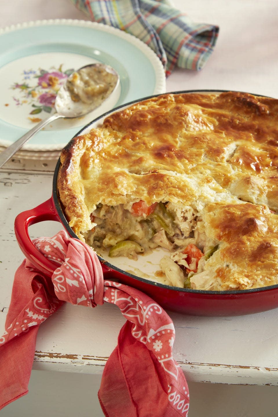 classic chicken pot pie in a red enamel cast iron skillet