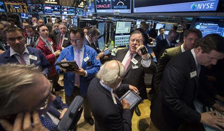 Traders work on the floor of the New York Stock Exchange April 15, 2014. REUTERS/Brendan McDermid