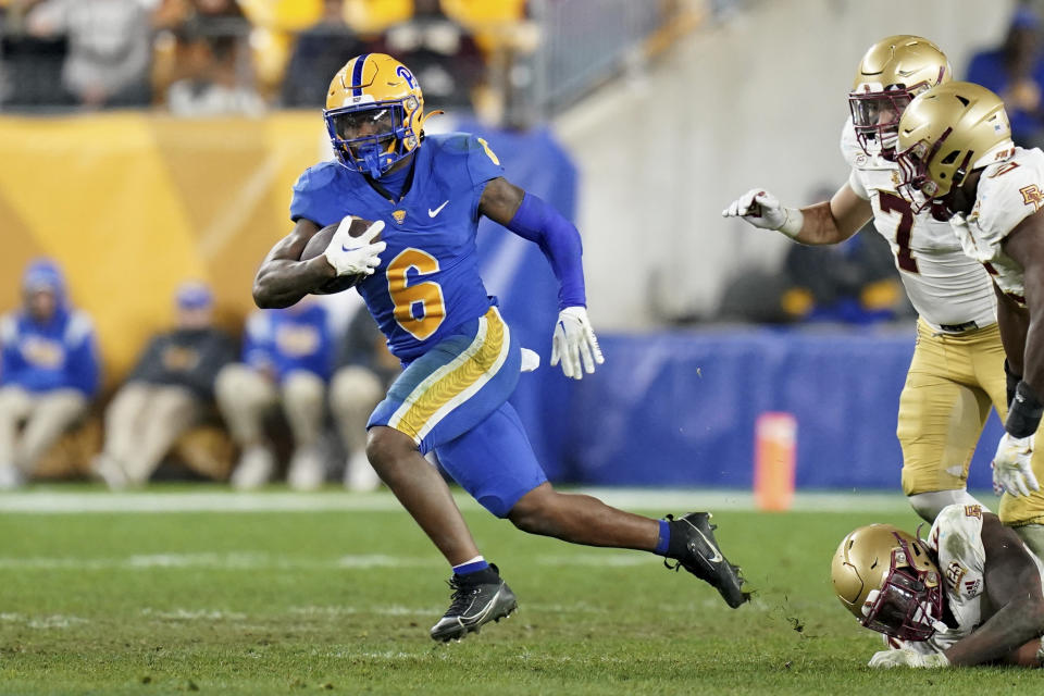 Pittsburgh running back Rodney Hammond Jr. (6) carries for a first down during the second half of an NCAA college football game against Boston College, Thursday, Nov. 16, 2023, in Pittsburgh. (AP Photo/Matt Freed)