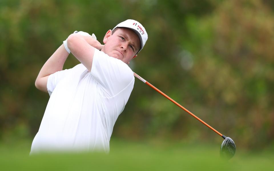 Robert MacIntyre of Great Britain & Ireland tees off on the third hole during the Friday Fourball matches of the Hero Cup at Abu Dhabi Golf Club - Robert Macintyre: 'I want to appear in the best event in the world - the Ryder Cup' - Andrew Redington/Getty Images