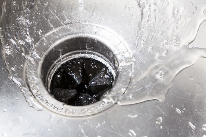 A sink garbage disposal