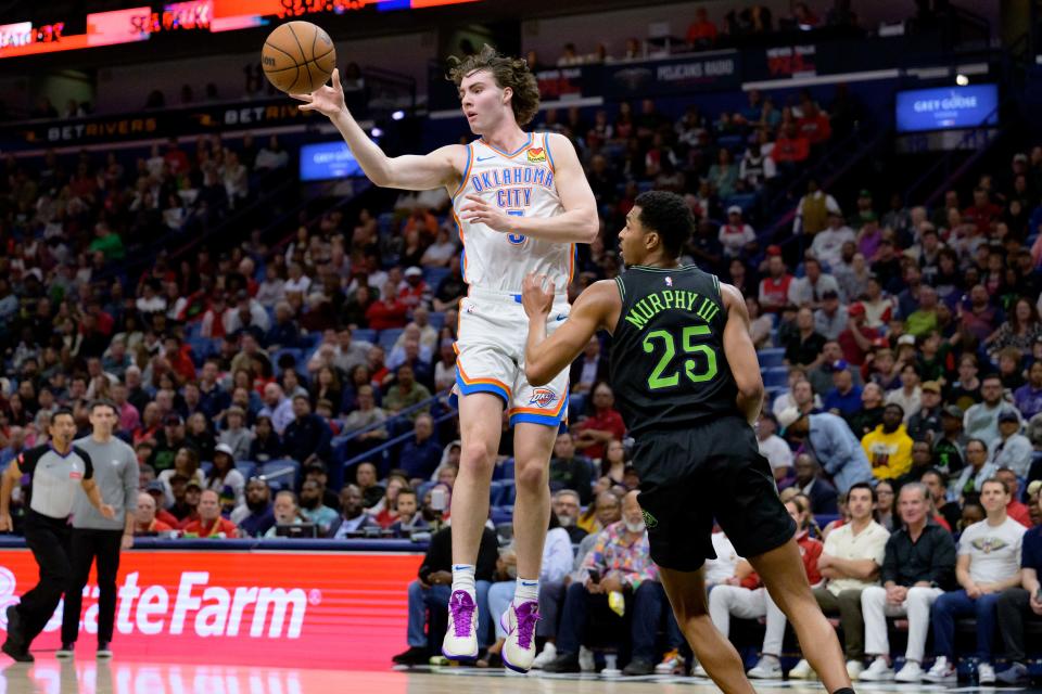 Thunder guard Josh Giddey (3) passes next to Pelicans guard Trey Murphy III (25) during the first half Tuesday night at Smoothie King Center in New Orleans.