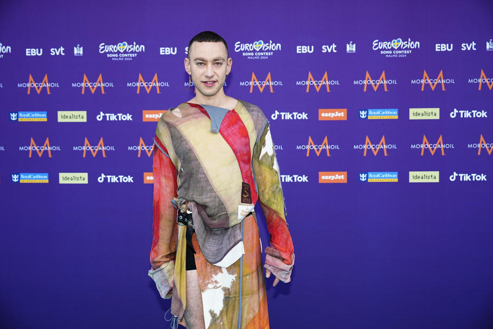 Olly Alexander attends the turquoise carpet of the 66th Eurovision Song Contest