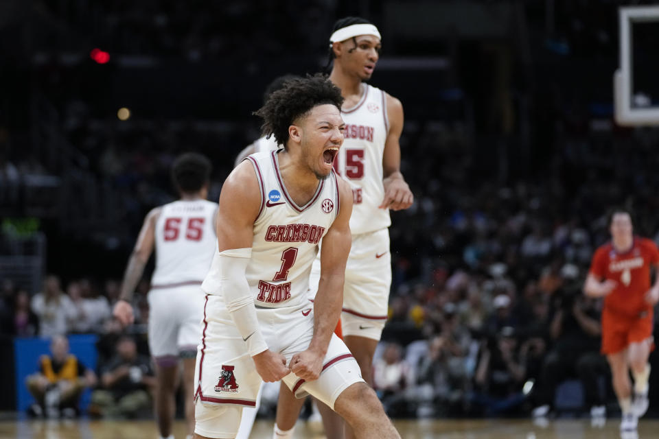 Alabama guard Mark Sears (1) celebrates after scoring during the first half of an Elite 8 college basketball game against Clemson in the NCAA tournament Saturday, March 30, 2024, in Los Angeles. (AP Photo/Ashley Landis)