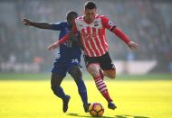 <p>Pierre-Emile Hojbjerg steams past Leicester’s Nampalys Mendy </p>