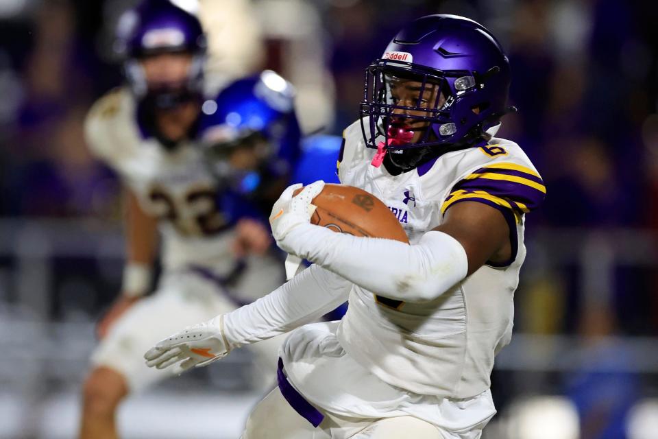 Columbia's Tray Tolliver (6) rushes for yards during the first quarter of a regular season football game Friday, Sept. 23, 2022 at Trinity Christian Academy in Jacksonville.  