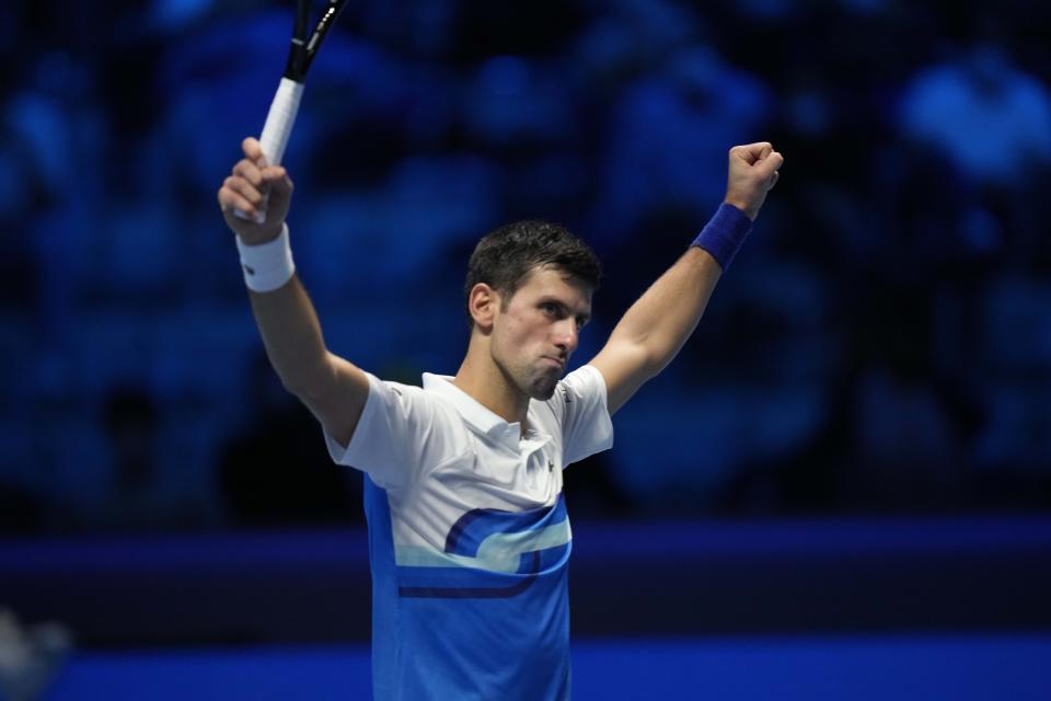 Serbia's Novak Djokovic celebrates after defeating Russia's Andrey Rublev during their ATP World Tour Finals singles tennis match, at the Pala Alpitour in Turin, Wednesday, Nov. 17, 2021. (AP Photo/Luca Bruno)