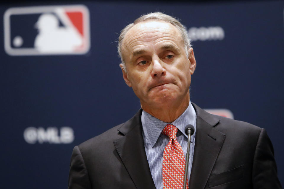 Baseball commissioner Rob Manfred pauses while speaking to the media at the owners meeting in Arlington, Texas, Thursday, Nov. 21, 2019. (AP Photo/LM Otero)