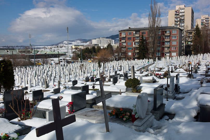 A winter scene in Sarajevo's Lion Cemetery where thousands of victims of the Siege of Sarajevo are buried