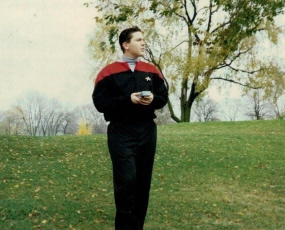 Rick Dunkle in a Starfleet uniform filming "Star Trek" scenes on a golf course as a teenager in 1995.