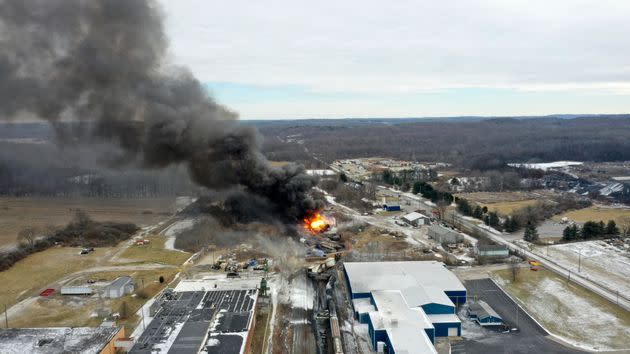 Smoke rises from the Norfolk Southern freight train that derailed in East Palestine, Ohio, on Feb 3.