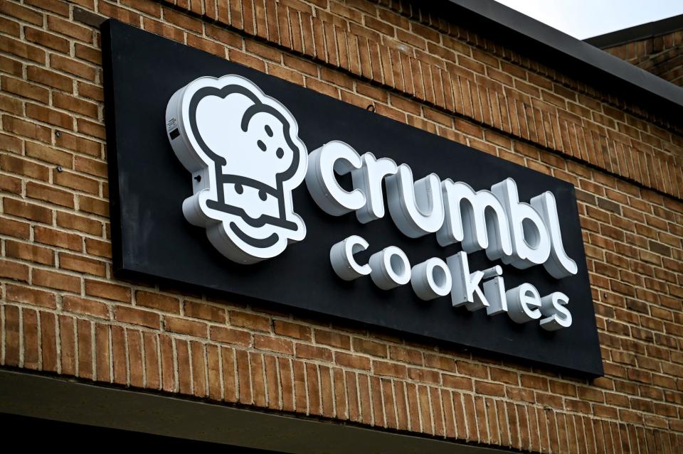 The sign outside the Crumbl Cookies location on Grand River Avenue on Monday, Nov. 6, 2023, in East Lansing.