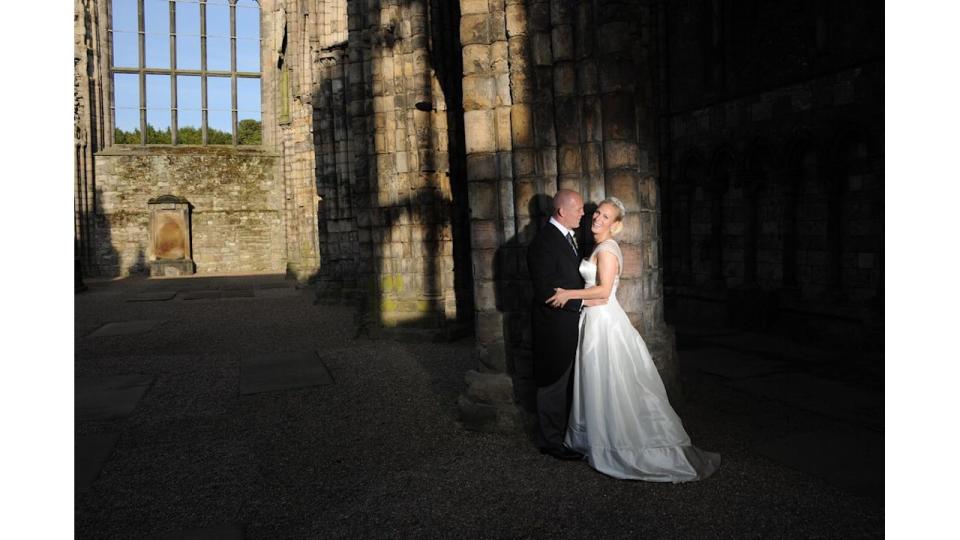 Mike Tindall and Zara Phillips are pictured in Holyrood Abbey, Palace of Holyroodhouse on their wedding day in 2011