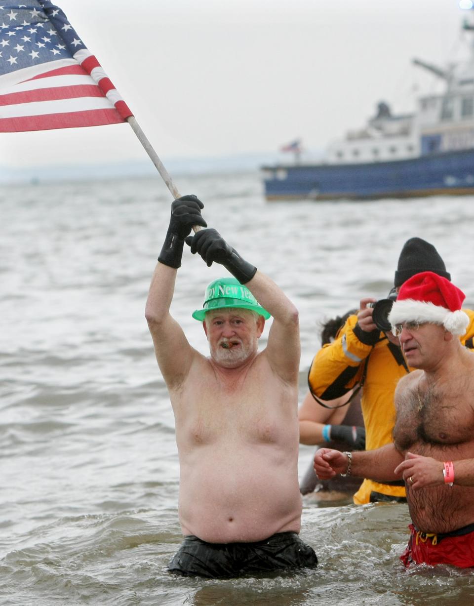 New York's Coney Island Polar Bear Club Takes The Icy Plunge On New Years