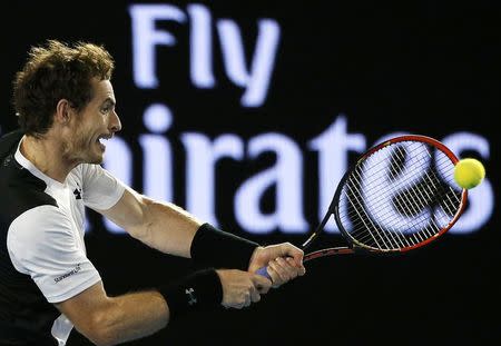 Britain's Andy Murray hits a shot during his semi-final match against Canada's Milos Raonic at the Australian Open tennis tournament at Melbourne Park, Australia, January 29, 2016. REUTERS/Tyrone Siu