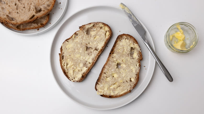 buttered bread on a plate