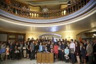 Arizona Republican Gov. Doug Ducey signs into law a distracted driving bill during a signing ceremony at the Arizona Capitol Monday, April 22, 2019, in Phoenix. Arizona becomes the 48th state to ban texting and the 18th to ban any hand-held phone use while driving. Officers can begin issuing warnings immediately and can write tickets in 2021. (AP Photo/Ross D. Franklin)