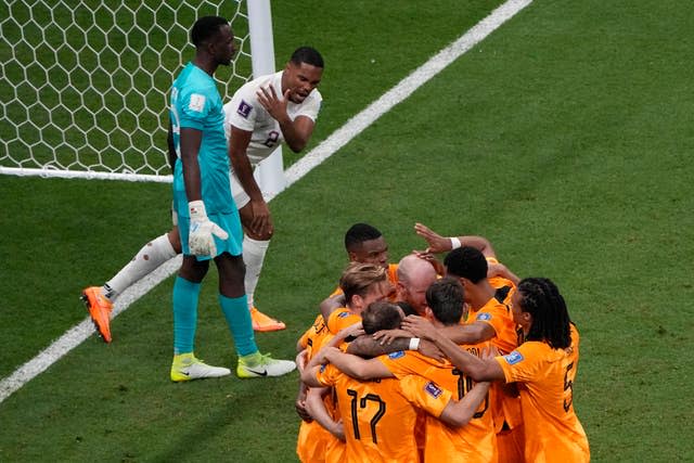 The Netherlands finished top of Group A after beating hosts Qatar 2-0 on Tuesday 