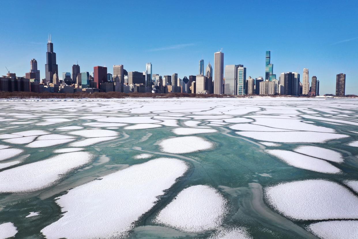 Police pleaded with people to stay off the unpredictable ice which formed along the shoreline of Lake Michigan near downtown Chicago last month (Getty Images)