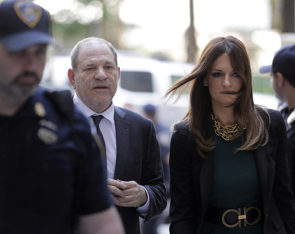 Harvey Weinstein, left, and attorney Donna Rotunno arrive at court for a hearing related to his sexual assault case, Thursday, July 11, 2019, in New York. Weinstein's lawyer Jose Baez is going to court Thursday to get a judge's permission to leave the case, the latest defection from what was once seen as a modern version of O.J. Simpson's "dream team" of attorneys. . (AP Photo/Seth Wenig)
