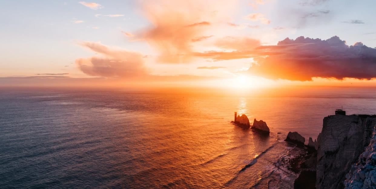 sunset at the famous lighthouse on the isle of wight