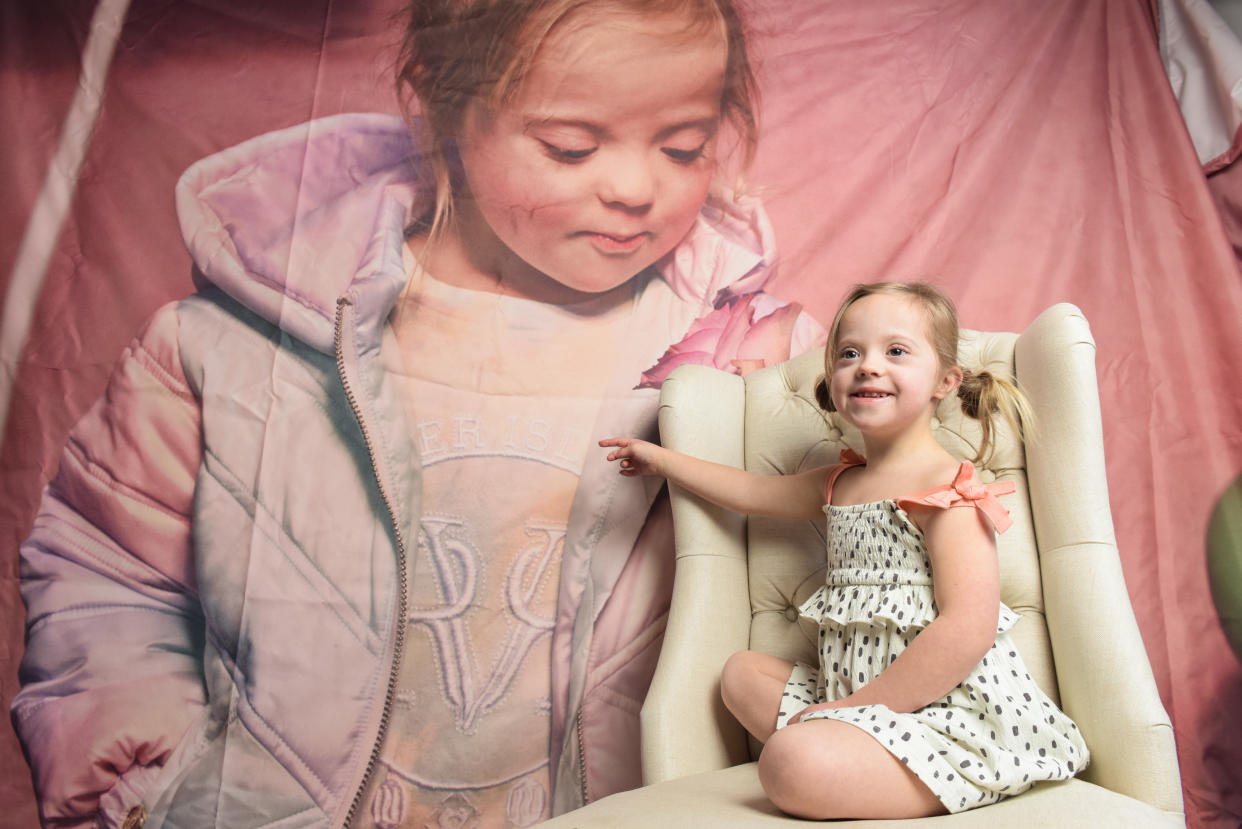 A five-year-old school girl with Down's syndrome has become the latest face of multiple big brands including JD Sports. (Caters)