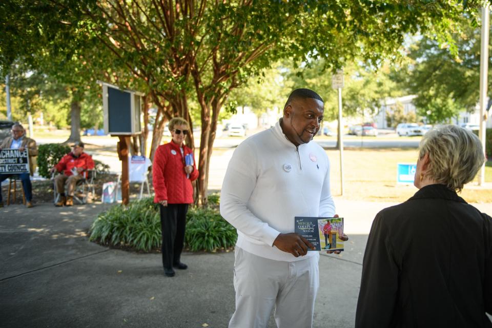 Mayor Mitch Colvin speaks to voters as they go into the Kiwanis Recreation Center to vote on Tuesday, Oct. 10, 2023. Unofficial results show Colvin winning a fourth term in office.