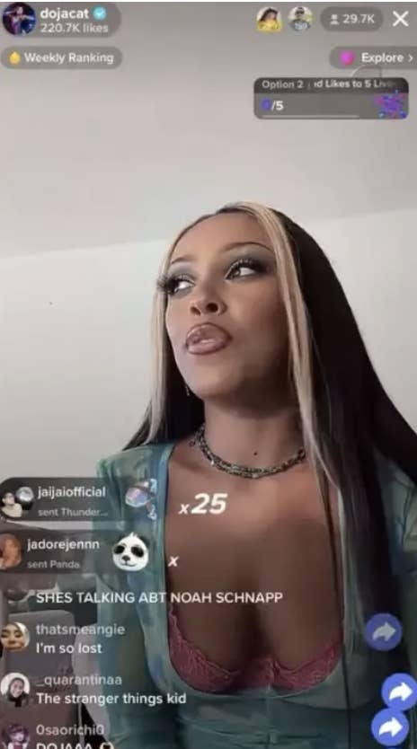 screenshot of Doja doing a live video with comments from people saying she's talking about noah