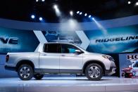 <p>Compared to the previous generation, the Ridgeline’s styling has been reigned in to a more conventional style. In a first, Honda will sell a front-wheel-drive version alongside the all-wheel-drive model.</p>