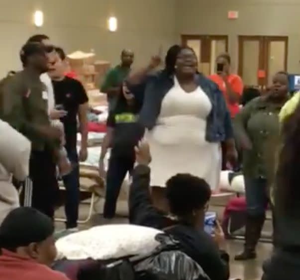 A woman breaks into gospel at a shelter for Hurricane Harvey victims in Conroe, Texas. (Photo: Joni Villemez-Comeaux/Facebook)