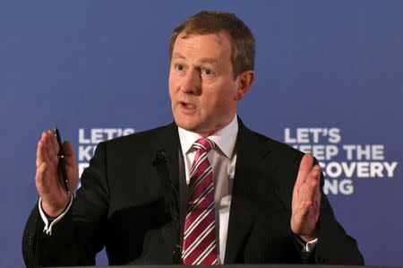 Ireland's Prime Minister Enda Kenny gestures as he addresses Fine Gael candidates and supporters in Dublin, Ireland February 3, 2016. REUTERS/Clodagh Kilcoyne