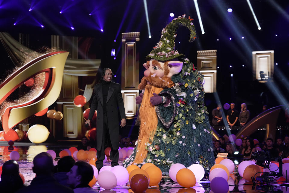 THE MASKED SINGER. L-R: Host Nick Cannon and Gnome in the season nine premiere episode of THE MASKED SINGER airing Wednesday, Feb.15 (8:00-9:00 PM ET/PT) on FOX. CR: Michael Becker/FOX ©2023 FOX Media LLC. C