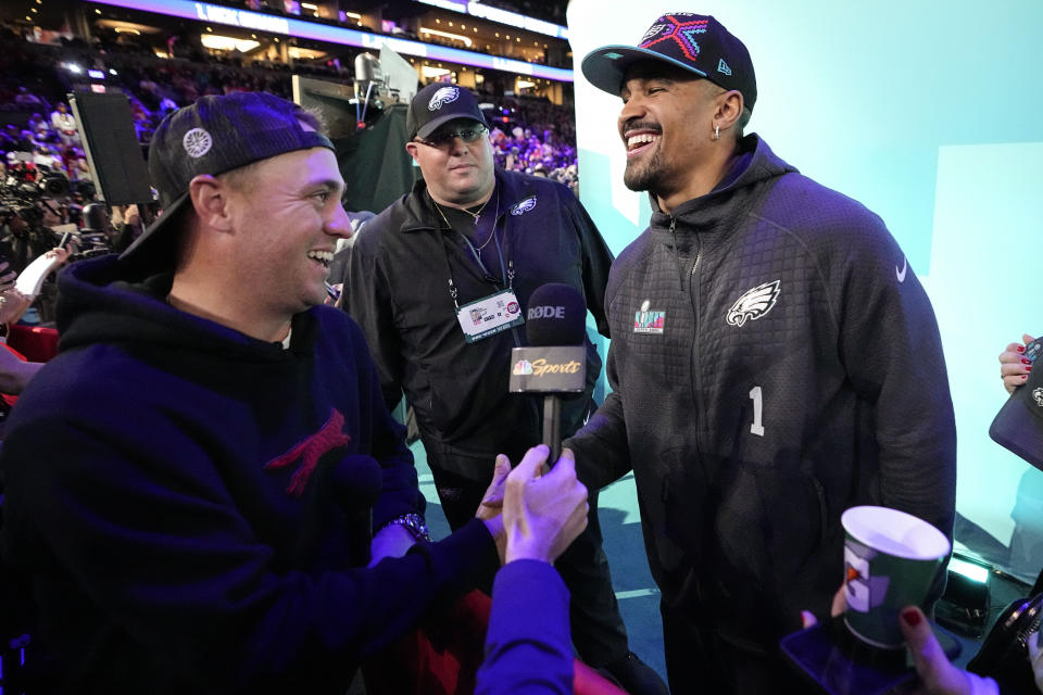 Kansas City Chiefs quarterback Patrick Mahomes, right, and Philadelphia Eagles quarterback Jalen Hurts speak to the media during the NFL football Super Bowl 57 opening night, Monday, Feb. 6, 2023, in Phoenix. The Kansas City Chiefs will play the Philadelphia Eagles on Sunday.(AP Photo/David J. Philip)