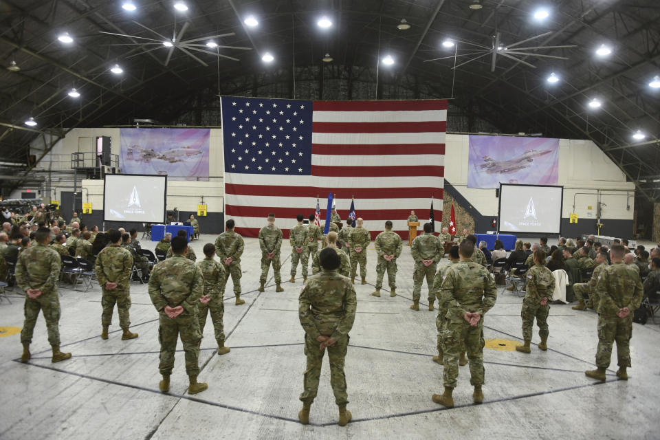 U.S. soldiers attend the activation ceremony for the United States Space Forces Korea in Pyeongtaek, South Korea Wednesday, Dec. 14, 2022. U.S. military set up space-monitoring organizations, United States Space Forces Korea, in South Korea, aiming to keep an eye on North Korea's nuclear and missile activity as its capabilities continue to improve. (Song Kyung-Seok/Pool Photo via AP)