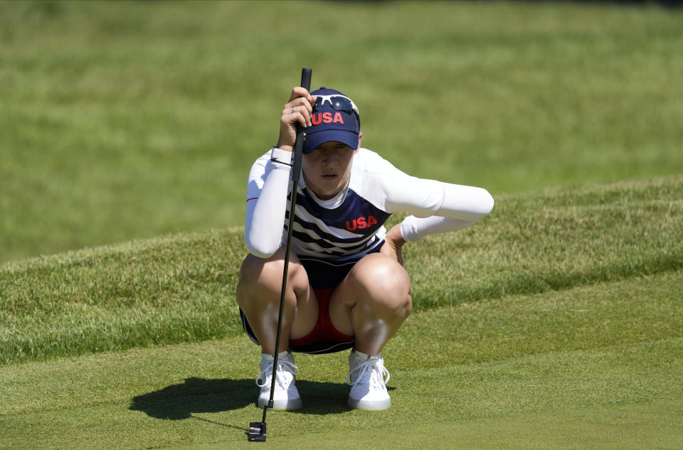 Nelly Korda, of the United States, lines up a putt on the 14th hole during the second round of the women's golf event at the 2020 Summer Olympics, Thursday, Aug. 5, 2021, at the Kasumigaseki Country Club in Kawagoe, Japan. (AP Photo/Andy Wong)