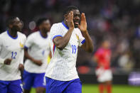 France's Youssouf Fofana celebrates scoring his side's first goal during an international friendly soccer match between France and Chile at the Orange Velodrome stadium in Marseille, southern France, Tuesday, March 26, 2024. (AP Photo/Daniel Cole)