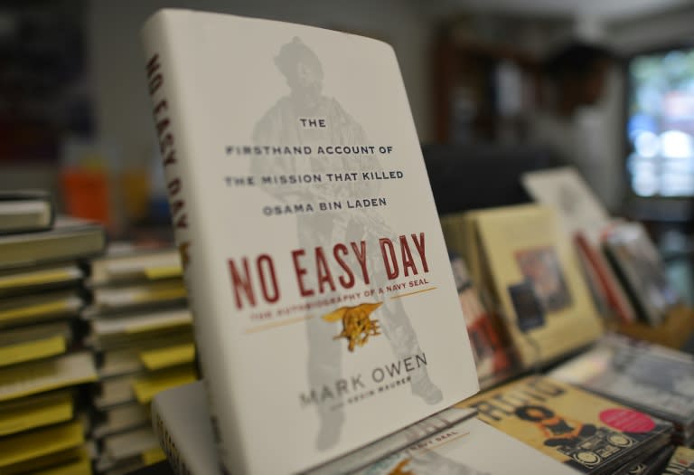 Copies of a book by a former Navy SEAL tittled "No Easy Day" are seen on display at a bookstore in Washington, DC