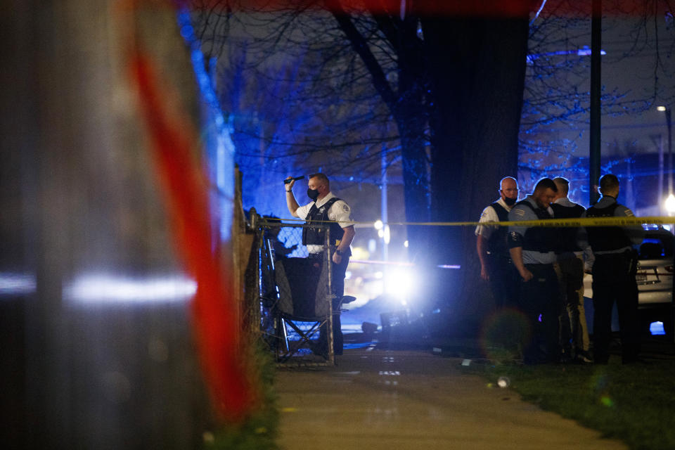 Chicago police work the scene of a shooting early Tuesday, April 6, 2021 in Chicago. Police say seven people were shot and wounded in a Chicago neighborhood overnight in the city’s latest wave of gun violence. Chicago police say the seven were involved in a fight on the sidewalk when shots were fired late Monday in the Englewood neighborhood on Chicago’s South Side. (Armando L. Sanchez/Chicago Tribune via AP)