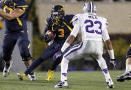 Stedman Bailey #3 of the West Virginia Mountaineers runs after the catch against the Kansas State Wildcats during the game on October 20, 2012 at Mountaineer Field in Morgantown, West Virginia. (Photo by Justin K. Aller/Getty Images)