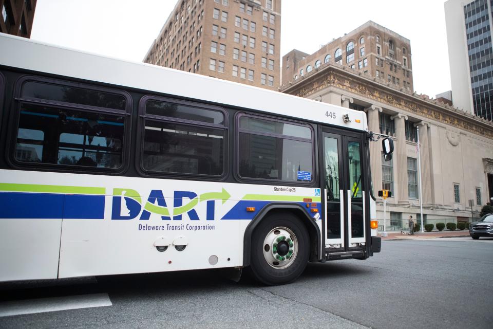 A DART bus heads up to Rodney Square on East 10th Street on Monday afternoon in downtown Wilmington. Gov. Carney signed into law a legislation that will give Delaware students more options for school transportation.