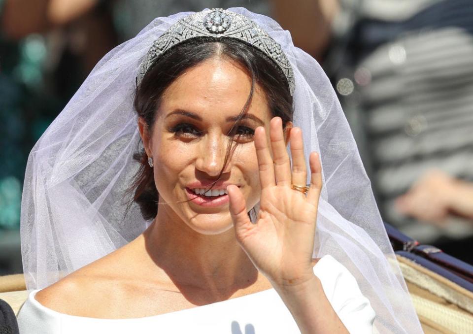 Meghan Markle waves on her wedding day in 2018