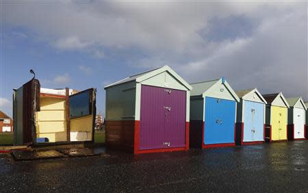 A beach hut has been overturned by strong winds during storms that battered Britain at Brighton in south east England October 28, 2013. REUTERS/Luke MacGregor