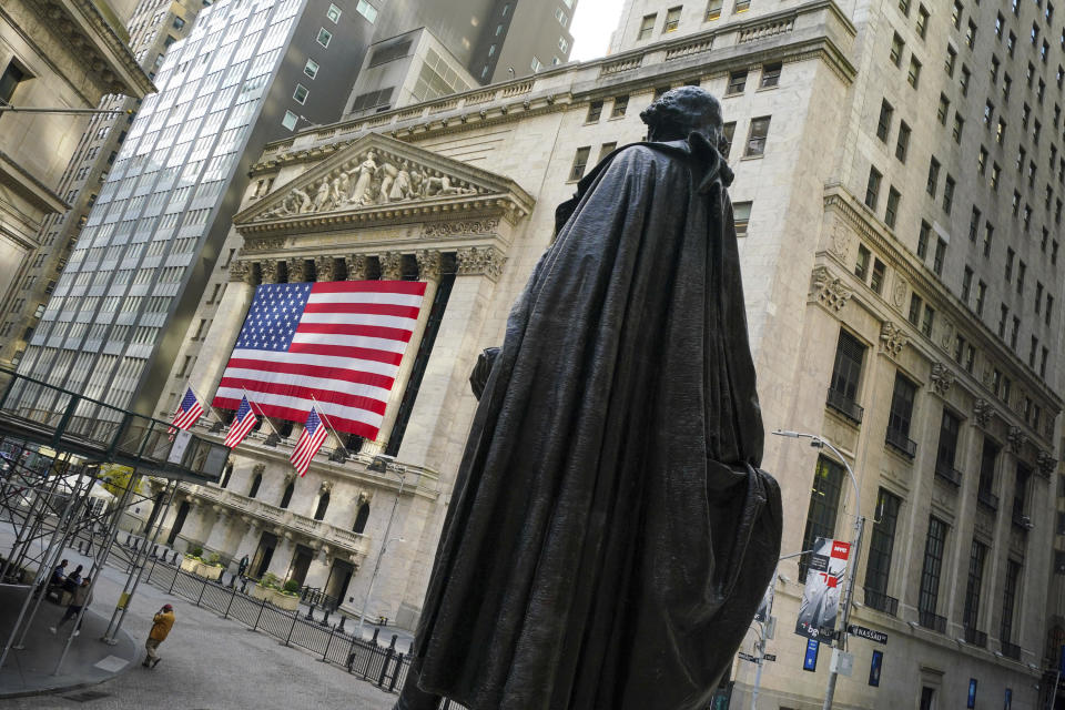 Photo by: John Nacion/STAR MAX/IPx 2020 11/10/20 Atmosphere in and around Wall Street and The New York Stock Exchange in the Financial District of Lower Manhattan, New York City on November 10, 2020. The U.S. stock market experienced a day of volatile trading on Monday, November 9, 2020 as Wall Street investors considered the Pfizer Inc. announcement of a COVID-19 vaccine along with the recent presidential election results. Some investment brokers including Fidelity, TD Ameritrade, Charles Schwab and Vanguard reported technical problems - though all reported the issues were resolved within several hours. Some attributed the problems to heavy activity early in the trading day. Here, a view of the statue of George Washington at Federal Hall facing the New York Stock Exchange. (NYC)