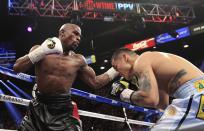 (Click on the image above to see more photos of Floyd Mayweather-Marcos Maidana action)