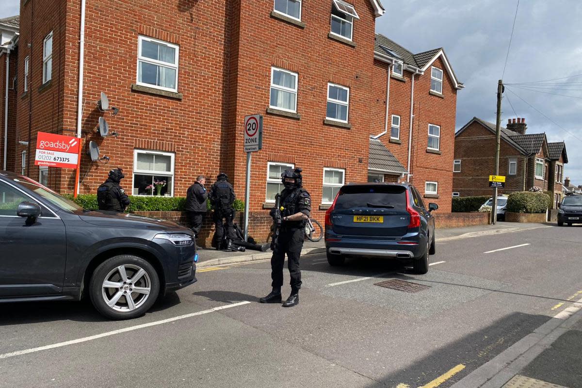 Armed police seen and officers investigating after report of 'woman in distress' <i>(Image: Newsquest)</i>