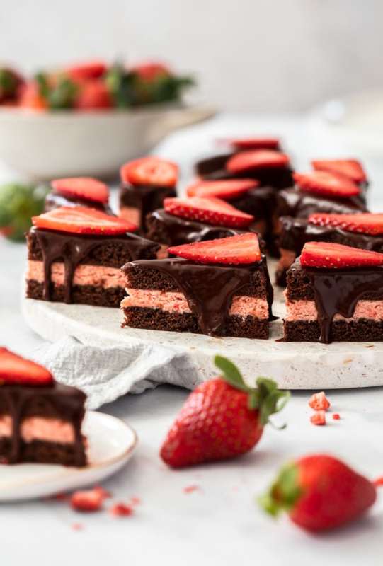 <p>Sugar Salt Magic</p><p>These strawberry chocolate petit fours are dainty, mini chocolate cakes filled with real strawberry buttercream and they’re easier to make than they look.</p><p><strong>Get the recipe: <a href="https://www.sugarsaltmagic.com/strawberry-and-chocolate-petit-fours/" rel="nofollow noopener" target="_blank" data-ylk="slk:Strawberry and Chocolate Petit Fours;elm:context_link;itc:0;sec:content-canvas" class="link rapid-noclick-resp">Strawberry and Chocolate Petit Fours</a></strong></p>