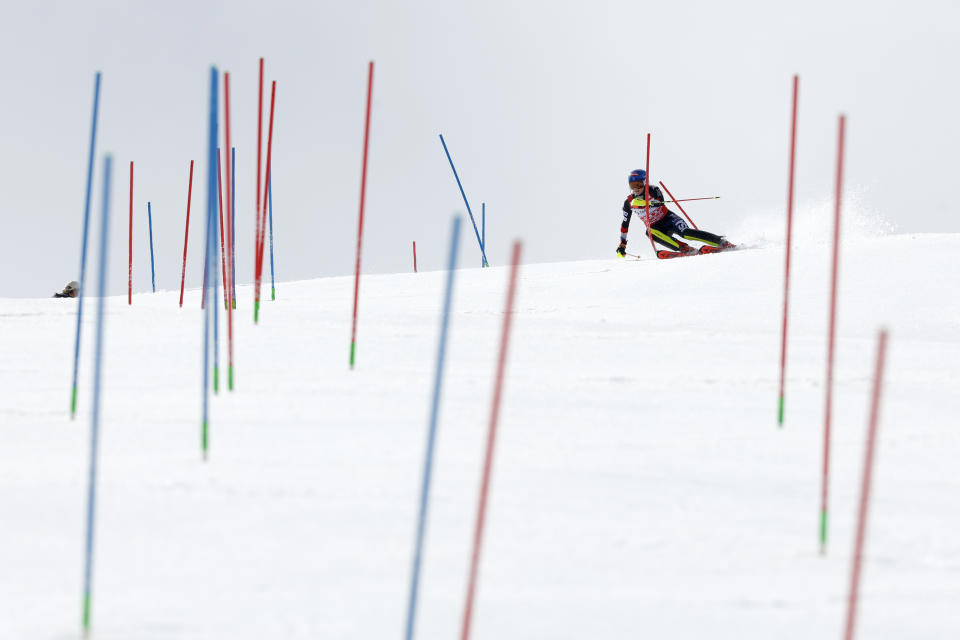 United States' Mikaela Shiffrin competes during the first run of an alpine ski, women's World Cup slalom race, in Saalbach, Austria, Saturday, March 16, 2024. (AP Photo/Alessandro Trovati)