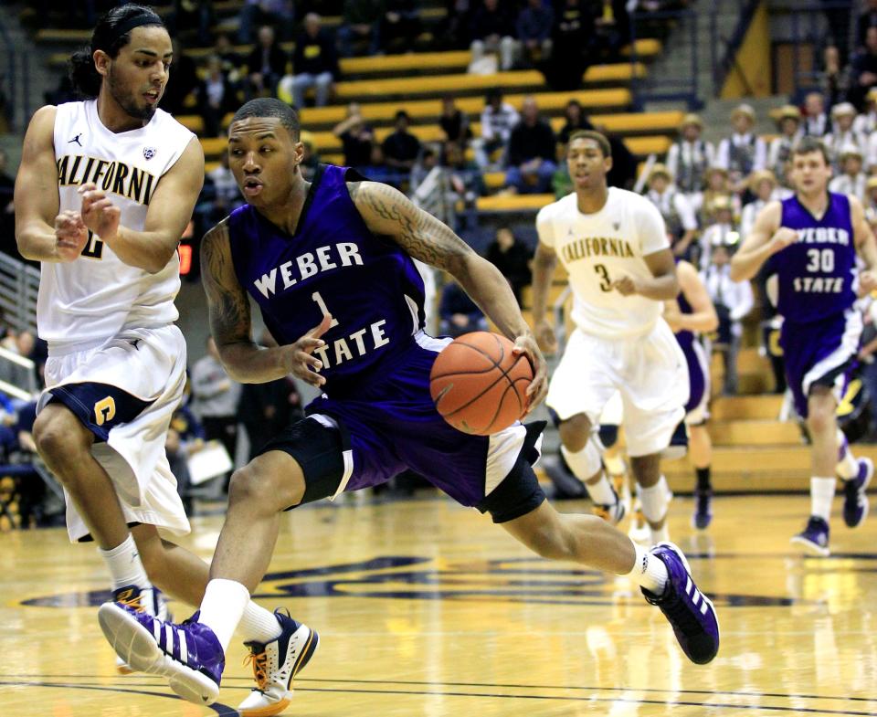 Damian Lillard dribbles into the paint for Weber State.