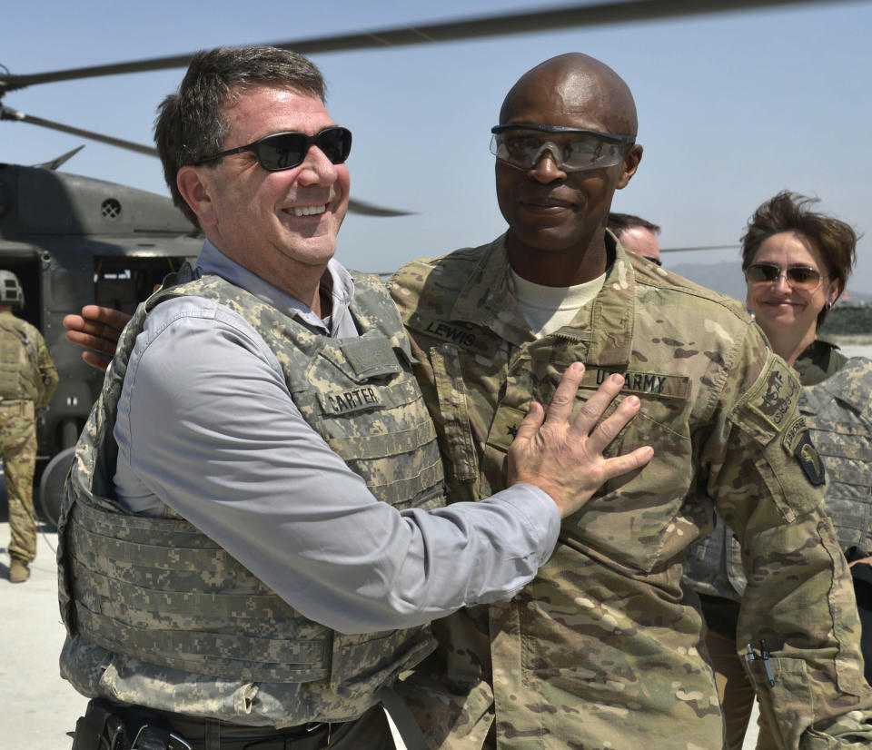 Image: Ash Carter, Ron Lewis (Glenn Fawcett / DOD via AP)